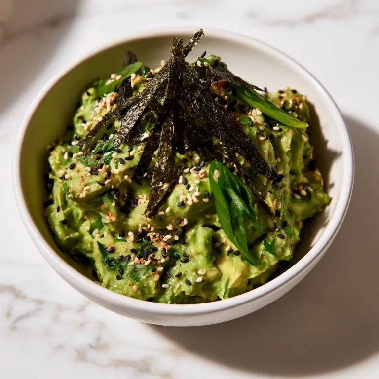 Japanese fusion guacamole in a white bowl